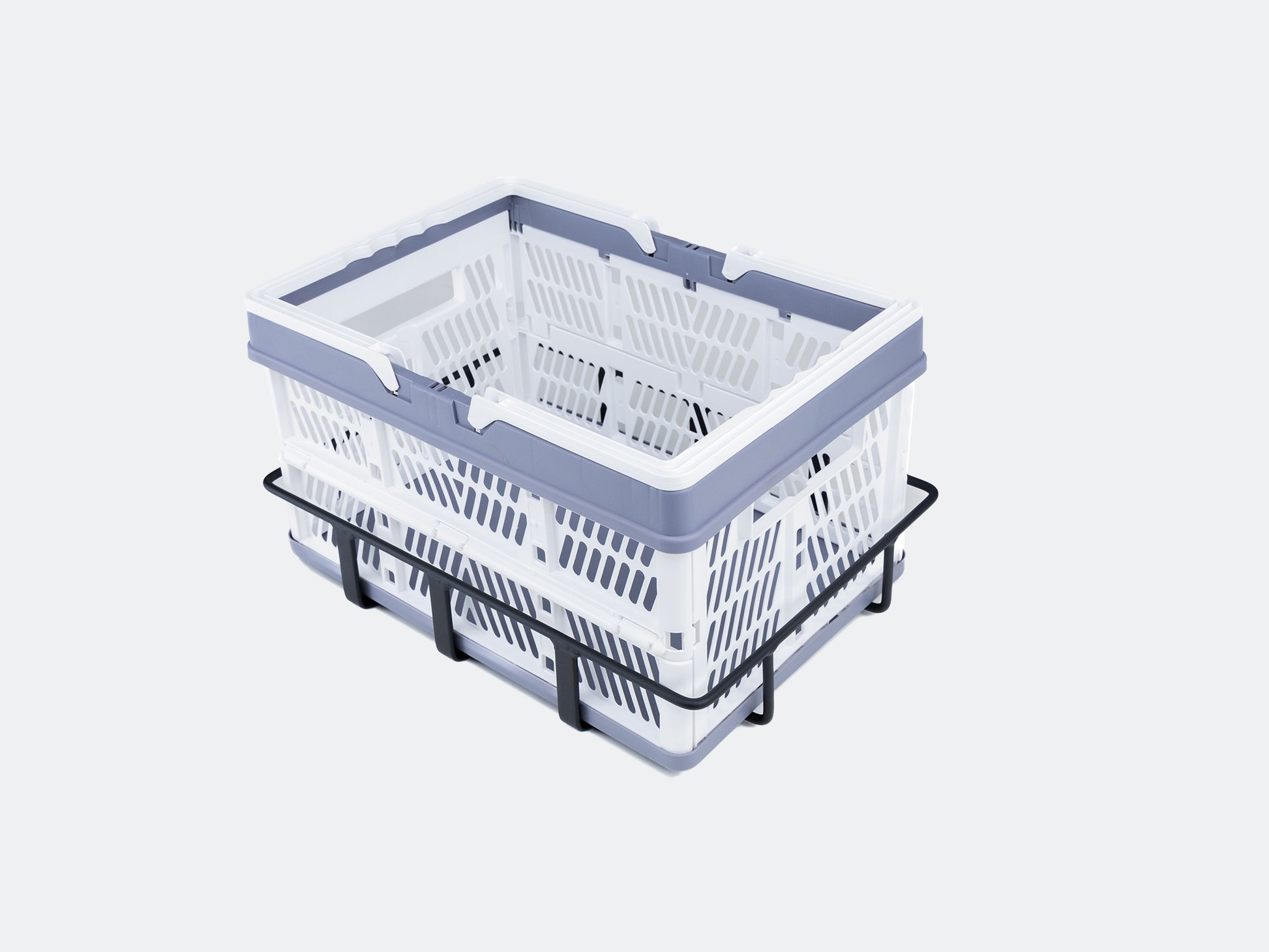 Velowave_White and gray plastic basket sitting inside a black metal frame (rear bicycle rack on a light gray background