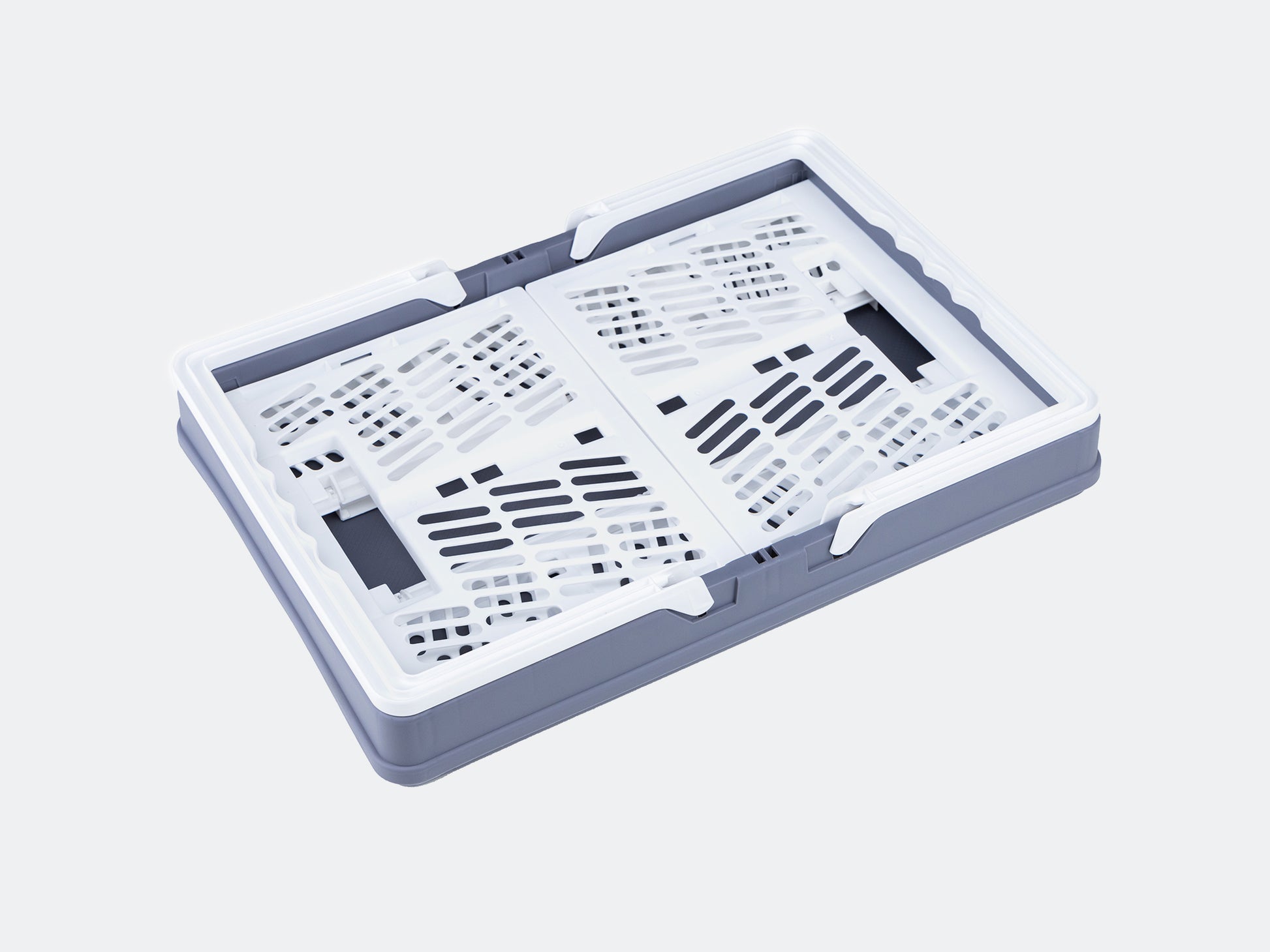 Velowave_White plastic collapsible basket on a light gray background