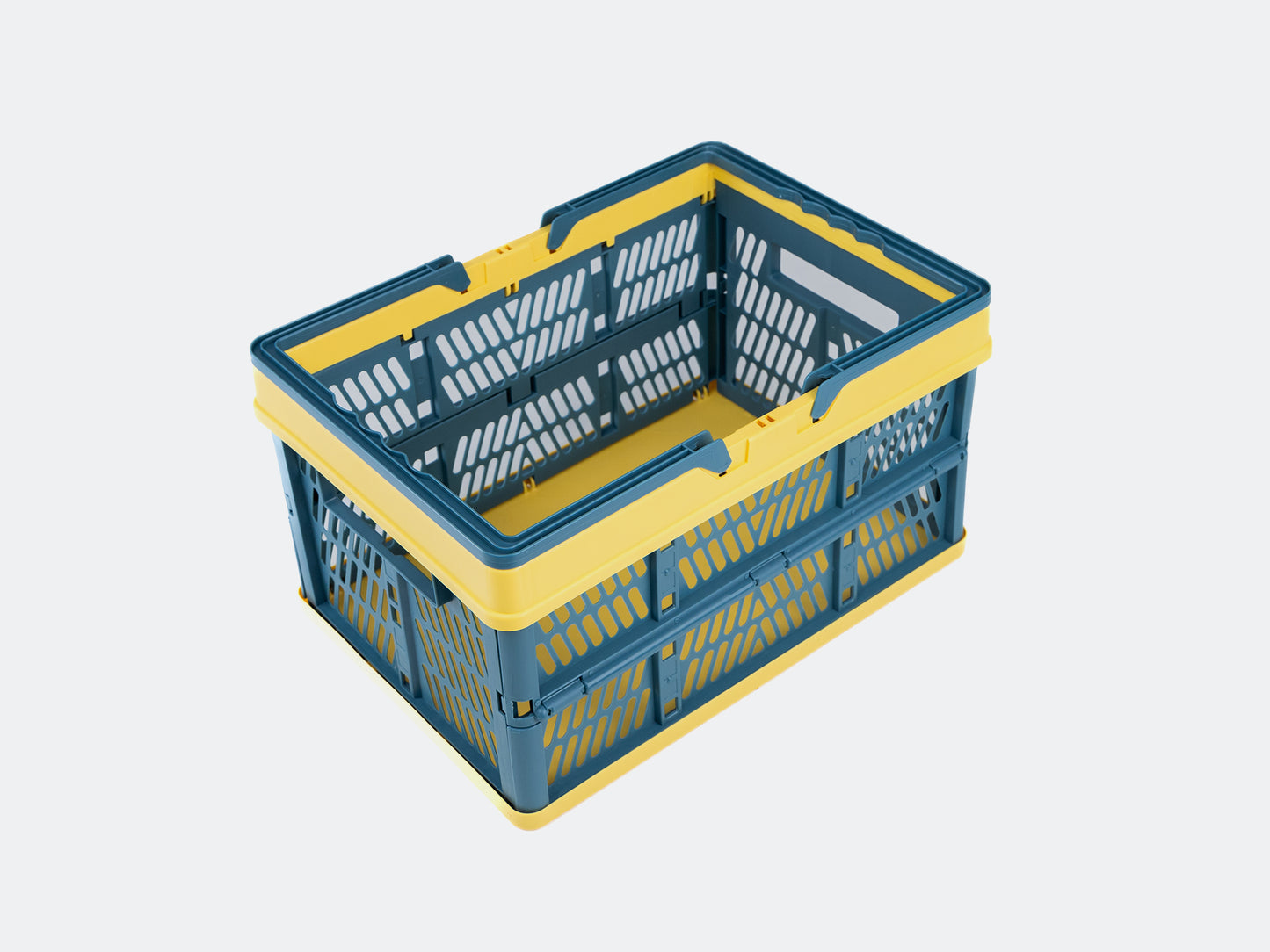 Velowave_Blue and yellow crate/basket on a light gray background