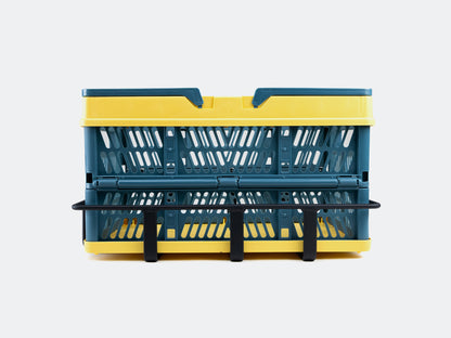 Velowave_Collapsible storage basket with yellow top and blue body on a white background