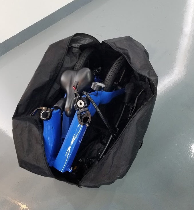 JupiterBikes_Black bike cover with a blue bike inside on a reflective surface