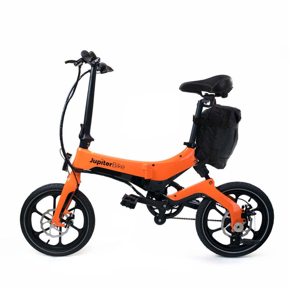 JupiterBikes_Orange and black folding bike with 'JupiterBike' branding with Bike Bag on the back of bike on a white background