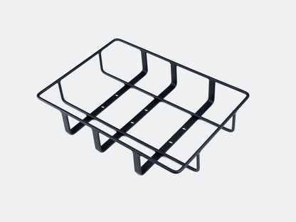 Velowave_Black metal grill rear rack on a light gray background