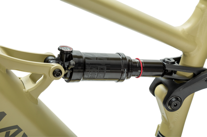 velowave_Close-up of a bicycle suspension fork on a olive green frame – BrawnyXM